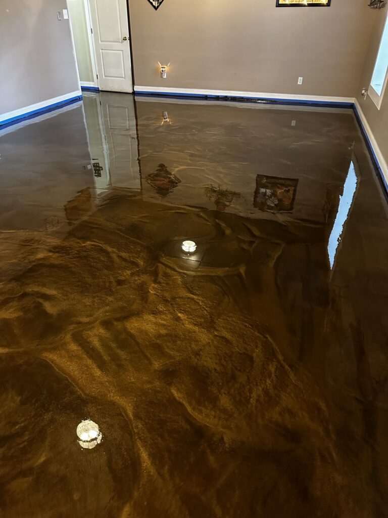 Photo of Brown Metallic Epoxy service that we did as Dyon Construction