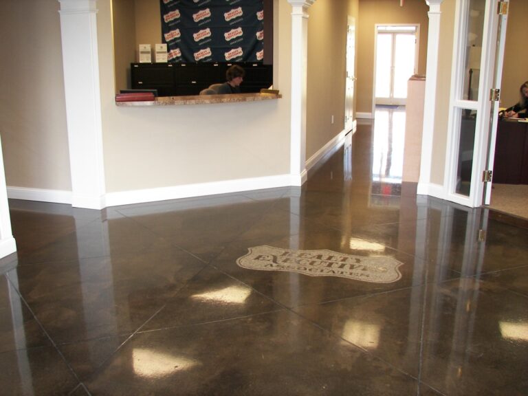 Photo of a Industrial Stained Concrete where we put a logo in concrete - Dyon Construction